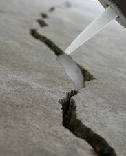 Injecting Urethane Into A Wall Crack